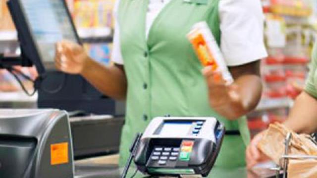 Card reader device at checkout