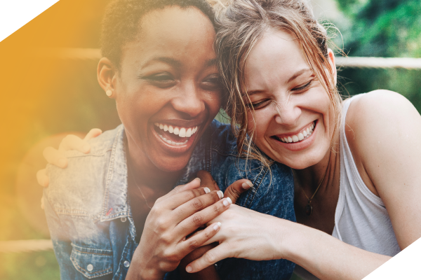 Two adults laughing