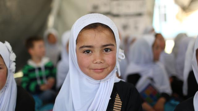 Child in a classroom in Afghanistan