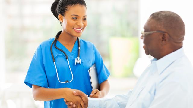 Nurse shaking hands with a patient