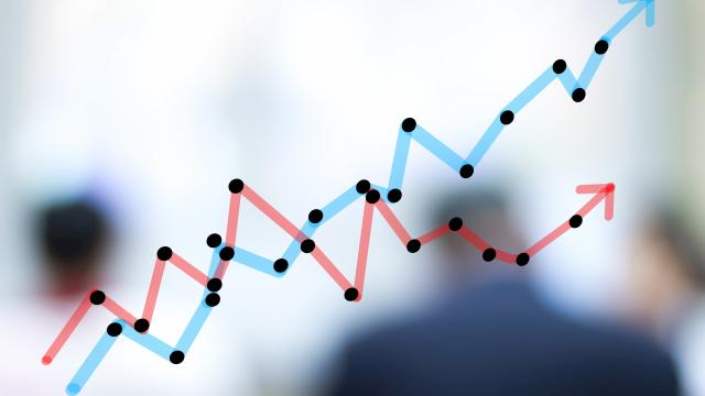 Line graph representing data trends with blurred people in background