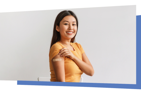 Adult showing a bandage on her arm after a vaccination