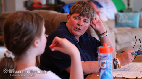 Wisconsin Wayfinder: Parent and Child at Kitchen Table Talking