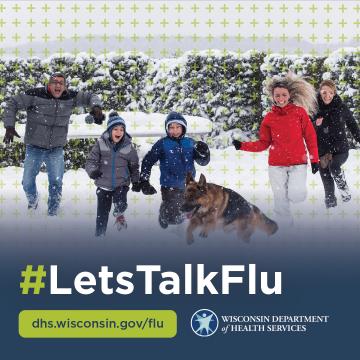 Family and a dog playing in the snow #LetsTalkFlu