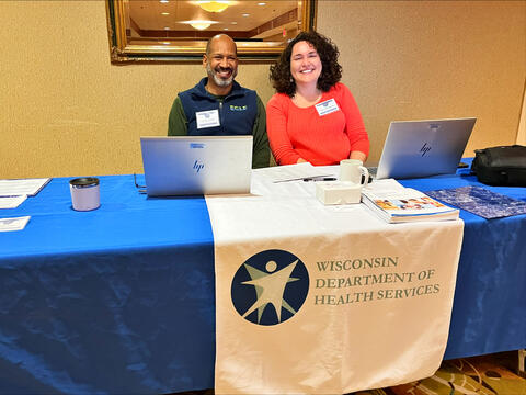 Michigan Radon Program Manager, Les Smith, (left) and Wisconsin Radon Program Manager, Amanda Koch, (right) greet attendees before the conference.