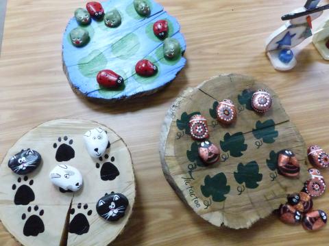 WMHI Log Cabin Games (tic tac toes with painted rocks)
