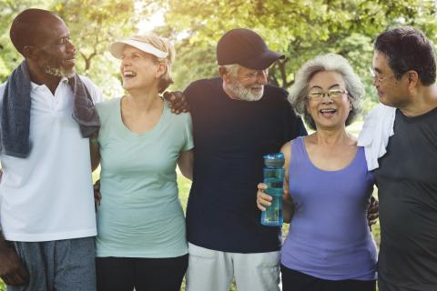 Five adults, post exercise, with water and towels