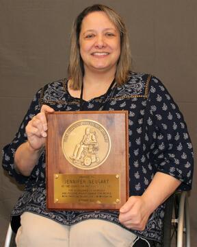 Jennifer Neugart receiving a 2023 Dan Johnson Advocacy Award Recipient