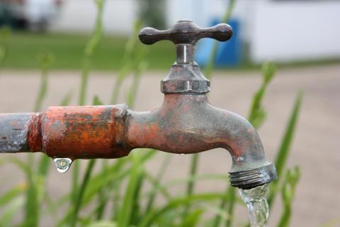 Rusty outdoor water faucet
