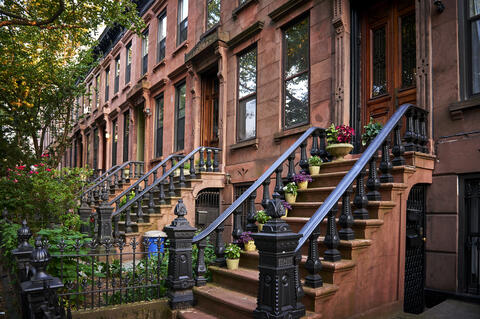Ornate front steps of townhouses.