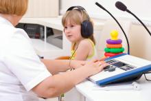 A child's hearing is being tested.