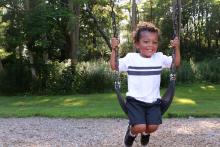 Young child on swing