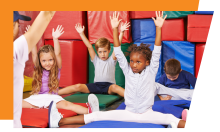 Children doing gymnastics at school