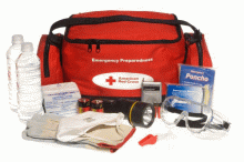 American Red Cross emergency preparedness kit with supplies out.