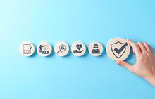 Safety icons on round wooden blocks