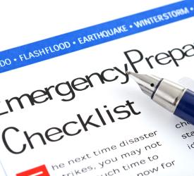 An emergency preparedness checklist with a pen